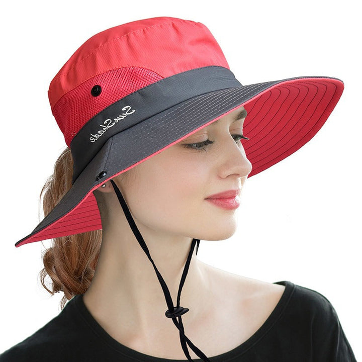 Women's stylish foldable sun hat, providing top UV protection with a wide brim, ideal for summer, beach, and travel.
