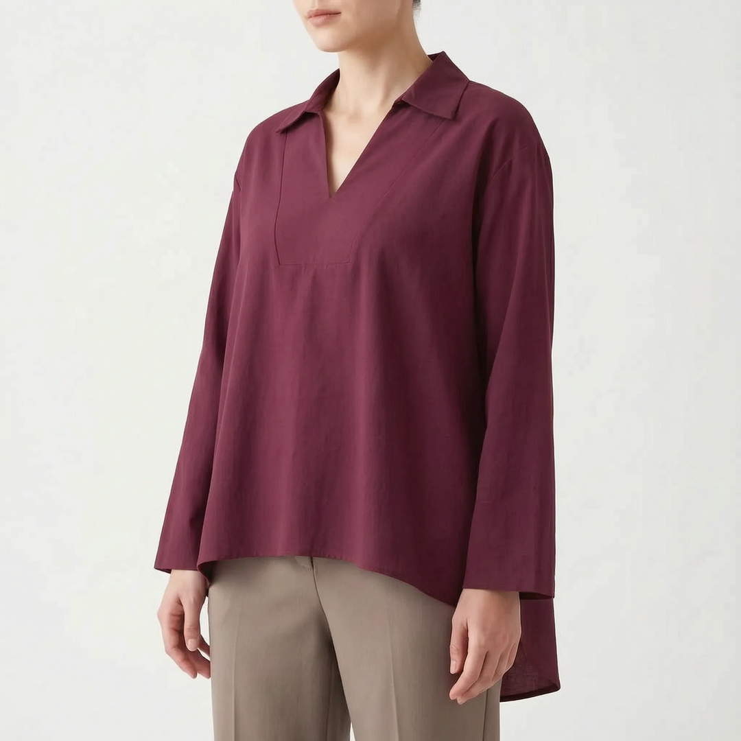Chic women's high-low tunic blouse, long sleeve V-neck. Effortless comfort for summer or fall fashion outfits.