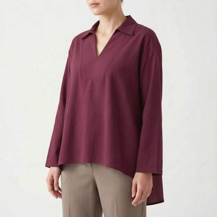Chic women's high-low tunic blouse, long sleeve V-neck. Effortless comfort for summer or fall fashion outfits.