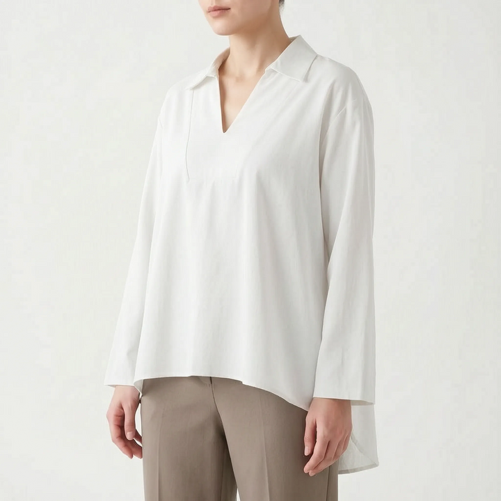 Modern women's casual tunic top. High-low hem and loose fit ensure ultimate comfort and versatile style.