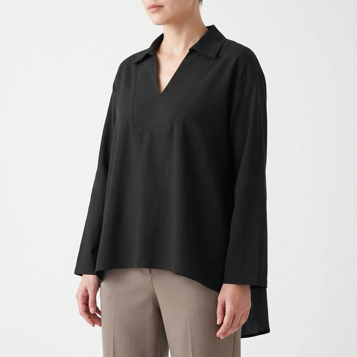 Stylish women's V-neck tunic top with a flattering high-low hem and comfortable long sleeves. Everyday fashion.