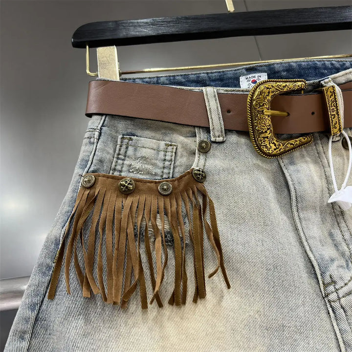 Front view: Women's stylish khaki fringe shorts, a must-have for summer and trendy apparel.