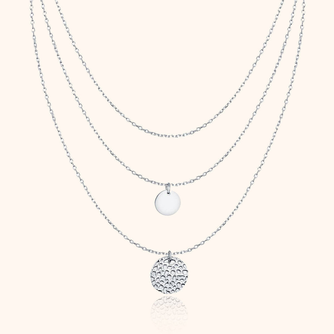 Elegant women's gold-plated layered necklace featuring chic circle pendants, adjustable for fashion jewelry.