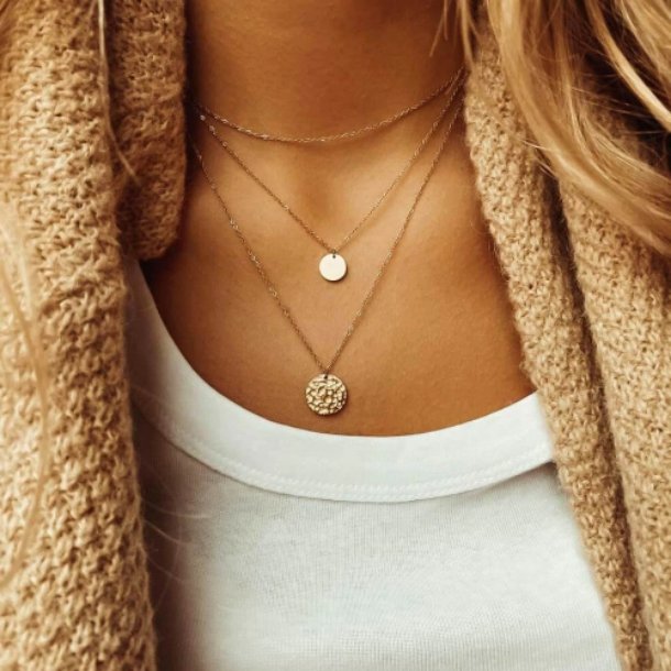 Fashionable women's gold-plated layered necklace with two delicate circle pendants, an elegant adjustable jewelry accessory.