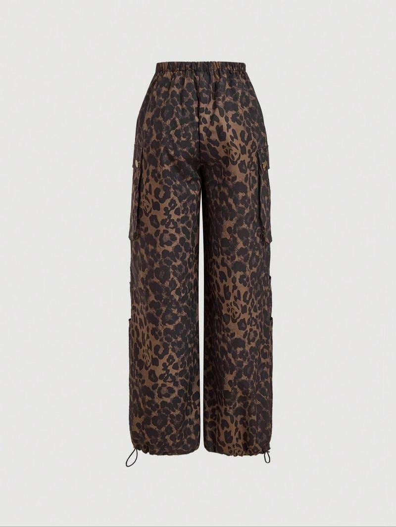 Model wearing chic women's leopard print cargo trousers, showcasing the relaxed wide-leg and stylish fit.