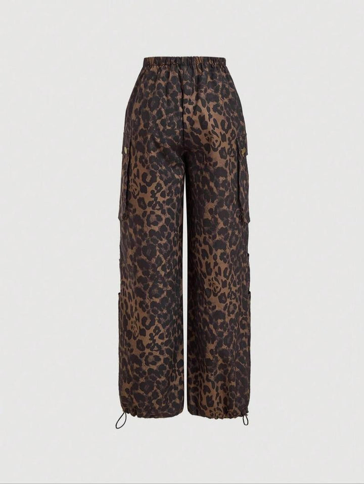 Model wearing chic women's leopard print cargo trousers, showcasing the relaxed wide-leg and stylish fit.