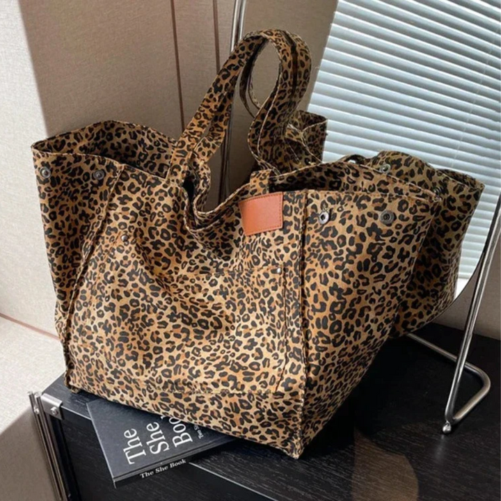 Elegant women's leopard print handbag, perfect for adding a chic touch to any outfit