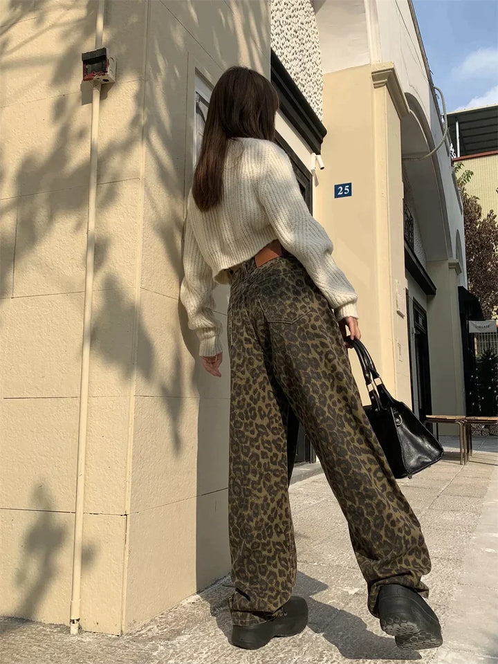Women's stylish leopard print jeans, perfect for a bold fashion statement. Trendy animal print denim.