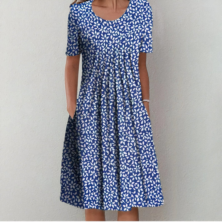 Elegant women's Lina spring/summer dress, versatile for casual fashion. Soft cotton.