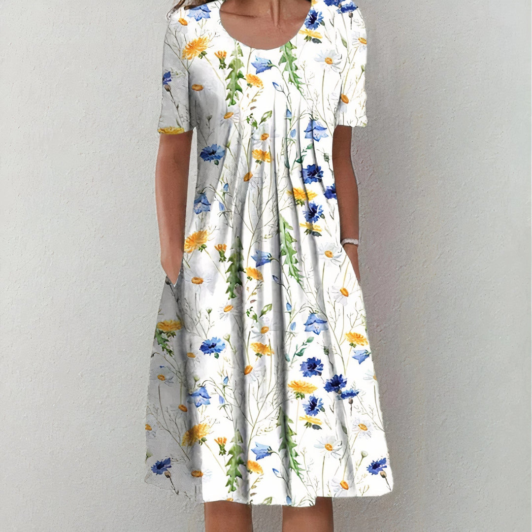 Chic Lina women's patterned cotton dress, a comfortable and stylish choice for warm spring days.