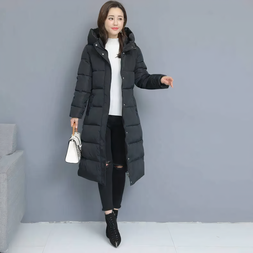 Cozy Mila long quilted jacket for women. Warm, fashionable winter outerwear with a padded design.