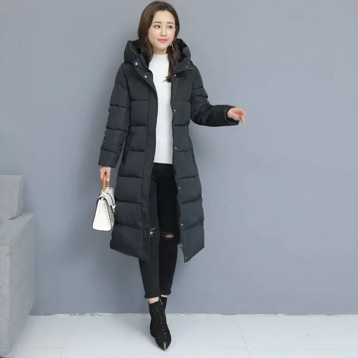 Cozy Mila long quilted jacket for women. Warm, fashionable winter outerwear with a padded design.