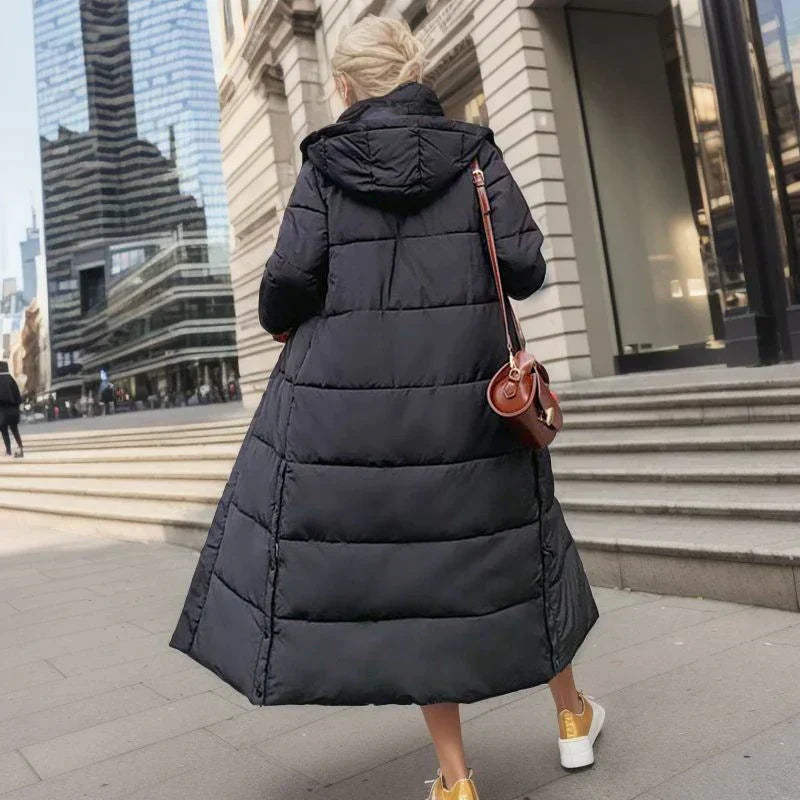 Fashion-forward women's long winter coat, ensuring warmth and a sophisticated look.