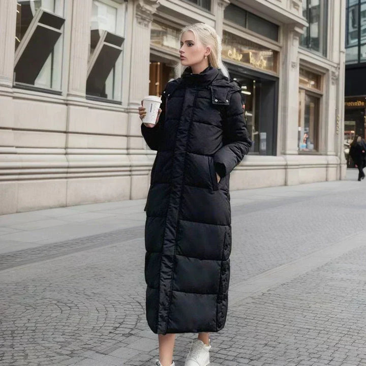 Stylish women's long winter jacket, offering elegance and protection from the cold.