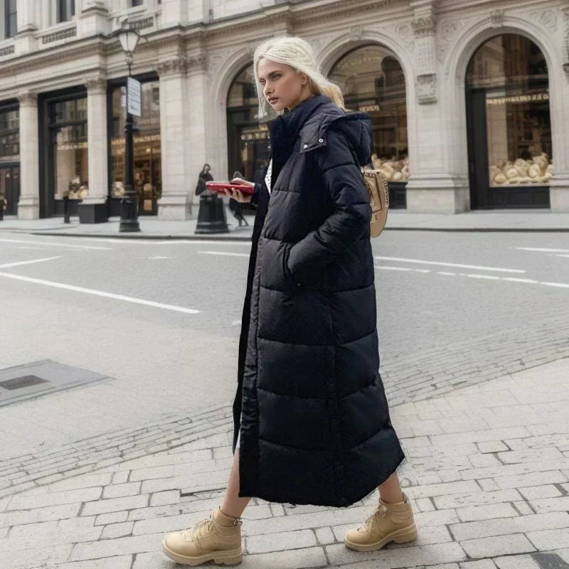 Cozy women's long winter jacket, perfect for enduring chilly temperatures with style.