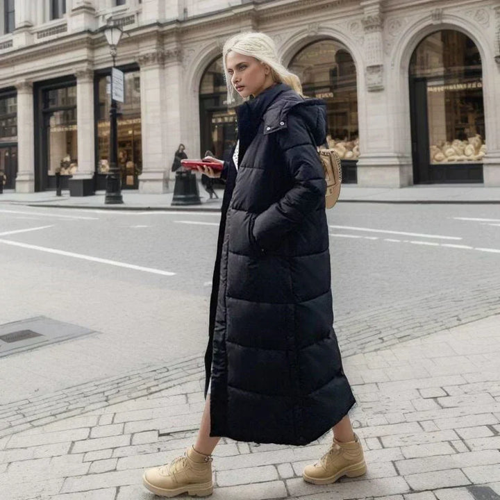Cozy women's long winter jacket, perfect for enduring chilly temperatures with style.