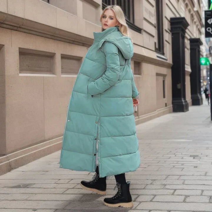 Seasonal fashion: women's long winter coat, an essential for cold weather style.