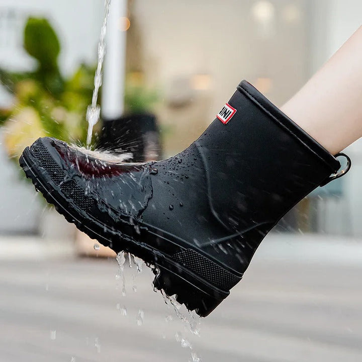 Chic mid-calf women's rain boots. Waterproof, comfortable, and fashionable for all wet weather.