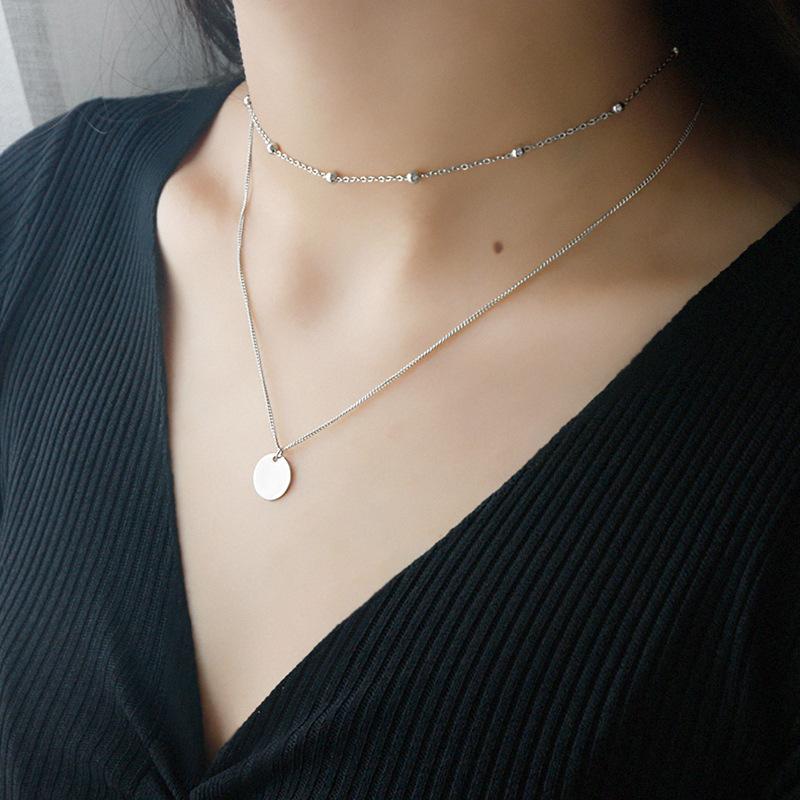 Elegant sterling silver multilayer necklace for women. A chic fashion accessory, ideal as a gift for her.
