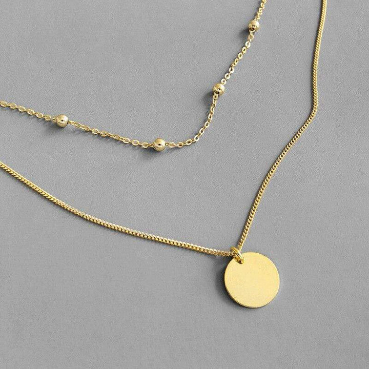 Stylish multilayer necklace for women, available in silver or gold. An elegant accessory & perfect gift.