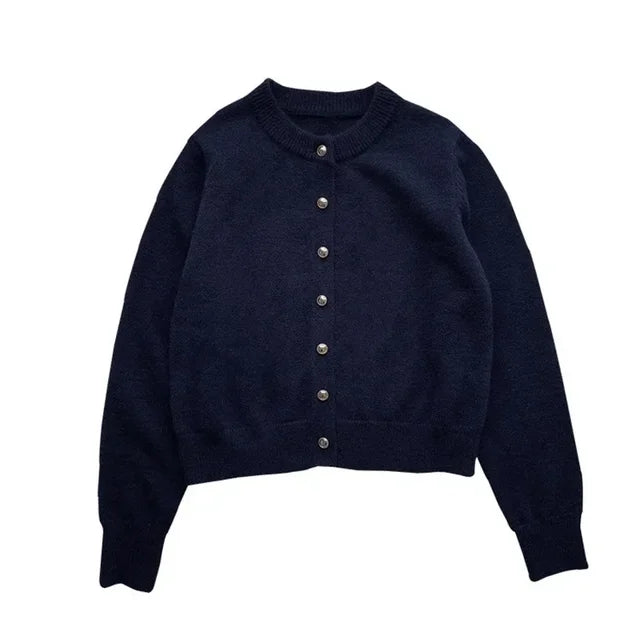 Comfortable women's o-neck knitted cardigan. Stylish knit sweater, perfect for versatile, elegant everyday looks.