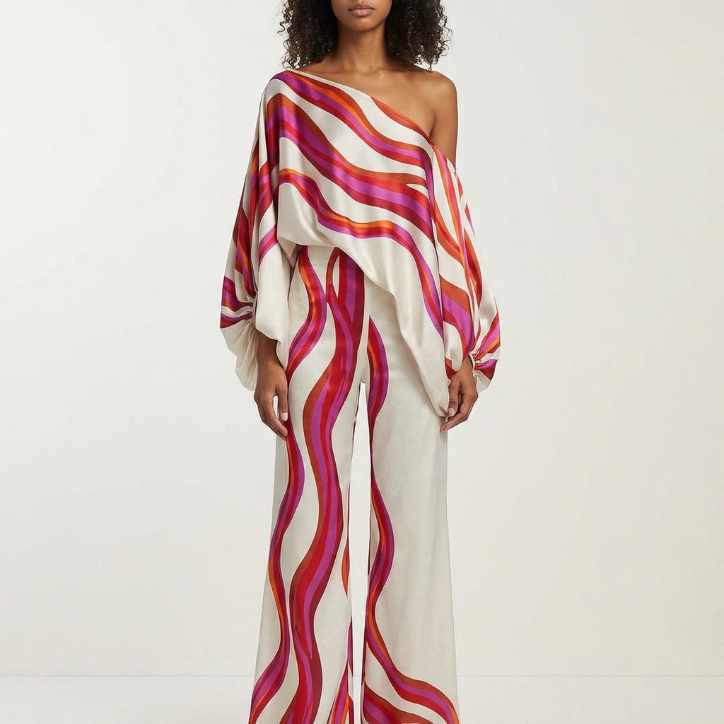 Women's stylish off-shoulder two-piece set. Printed top & matching shorts for summer fashion.