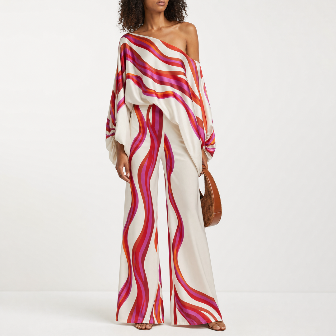 Plus size women's off-shoulder lantern sleeve two-piece set. Stylish printed top & shorts, ideal for summer vacation.