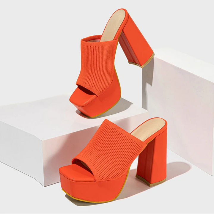 Women's stylish platform sandals with elevated sole for a comfortable & trendy summer look.