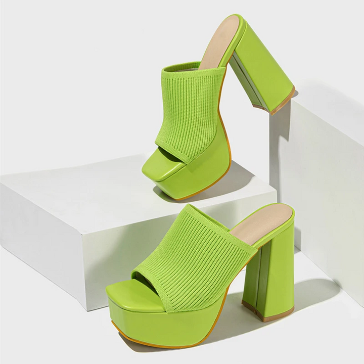 Trendy women's elevated platform sandals. Stable walk, stylish design for any occasion.