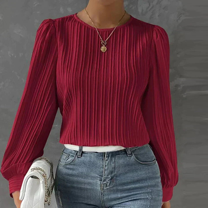 Ladies' stylish knit sweater top with unique pleated long sleeves, perfect for modern autumn fashion.