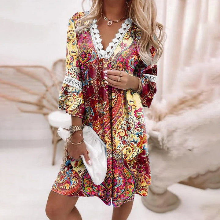 Bohemian printed 3/4 sleeve loose dress for women, perfect for summer days or vacation style.