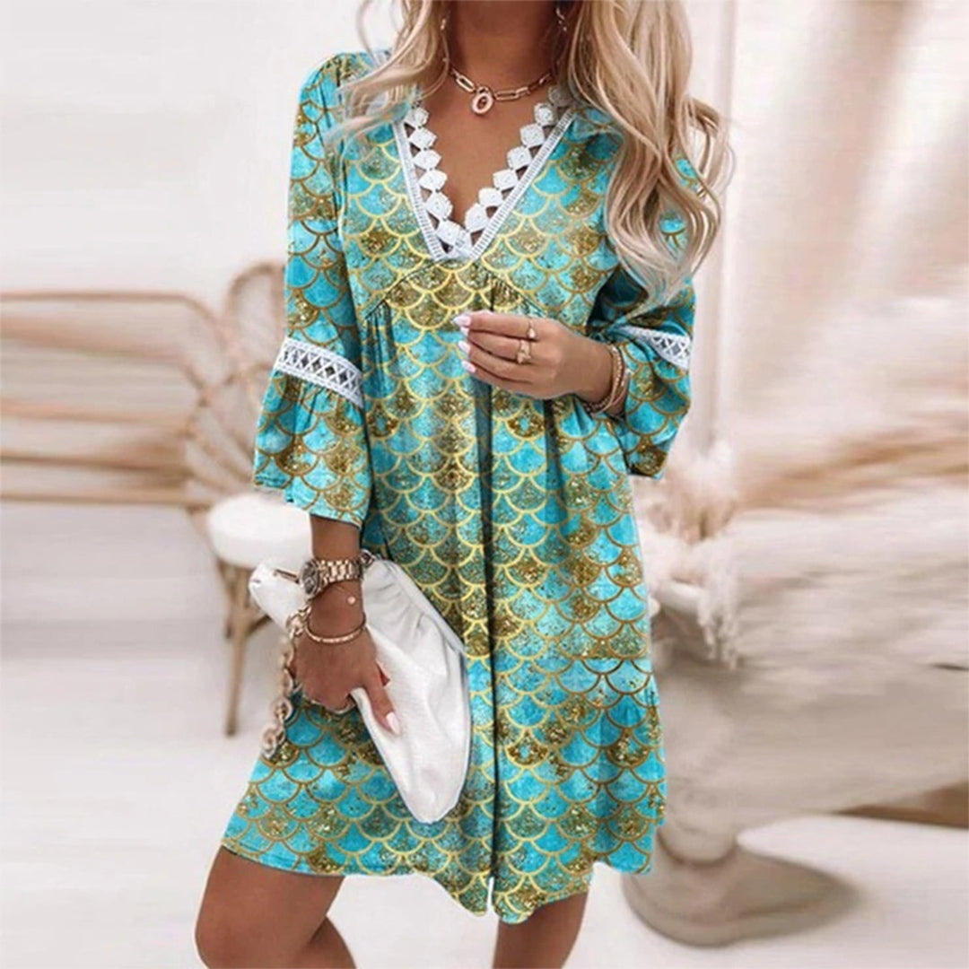 Comfortable women's loose fit printed summer dress with flowy design, great for casual elegance.