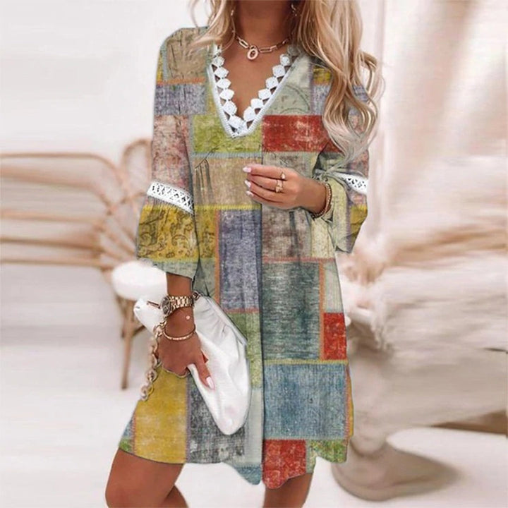 Amara printed loose fit day dress for women, featuring 3/4 sleeves and a comfortable, flowy silhouette.
