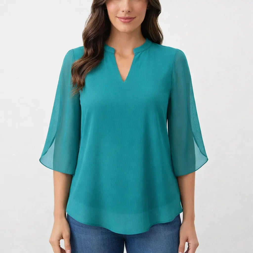 Elegant women's long sleeve relaxed fit top, ideal for a chic everyday look.