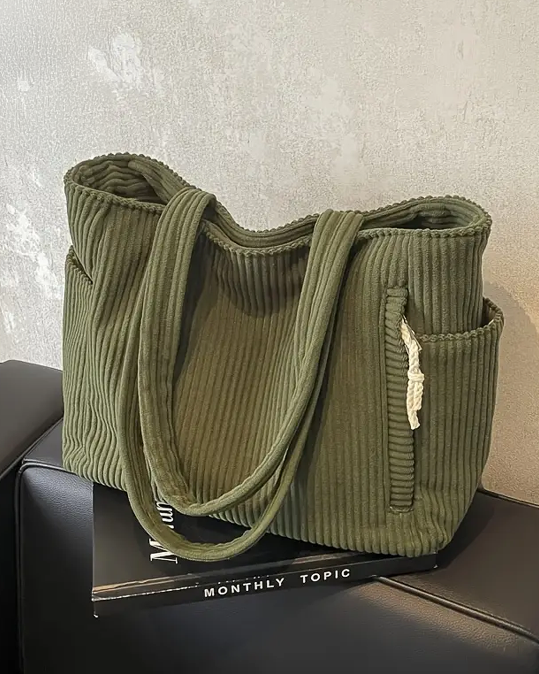 Chic ribbed tote bag for women, featuring elegant cord detail. A large, stylish everyday carryall.