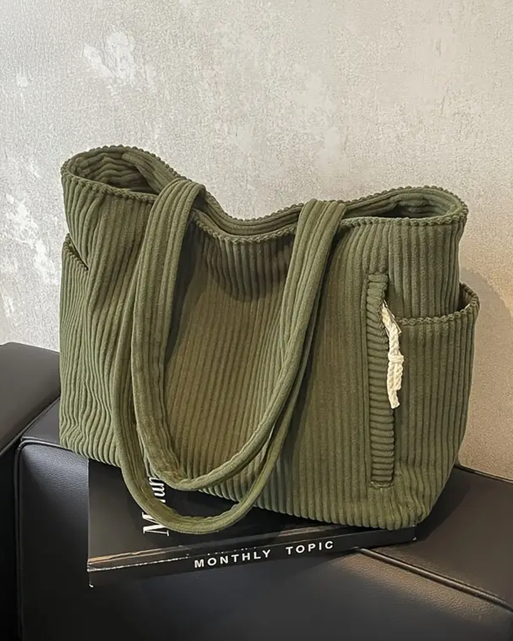 Chic ribbed tote bag for women, featuring elegant cord detail. A large, stylish everyday carryall.