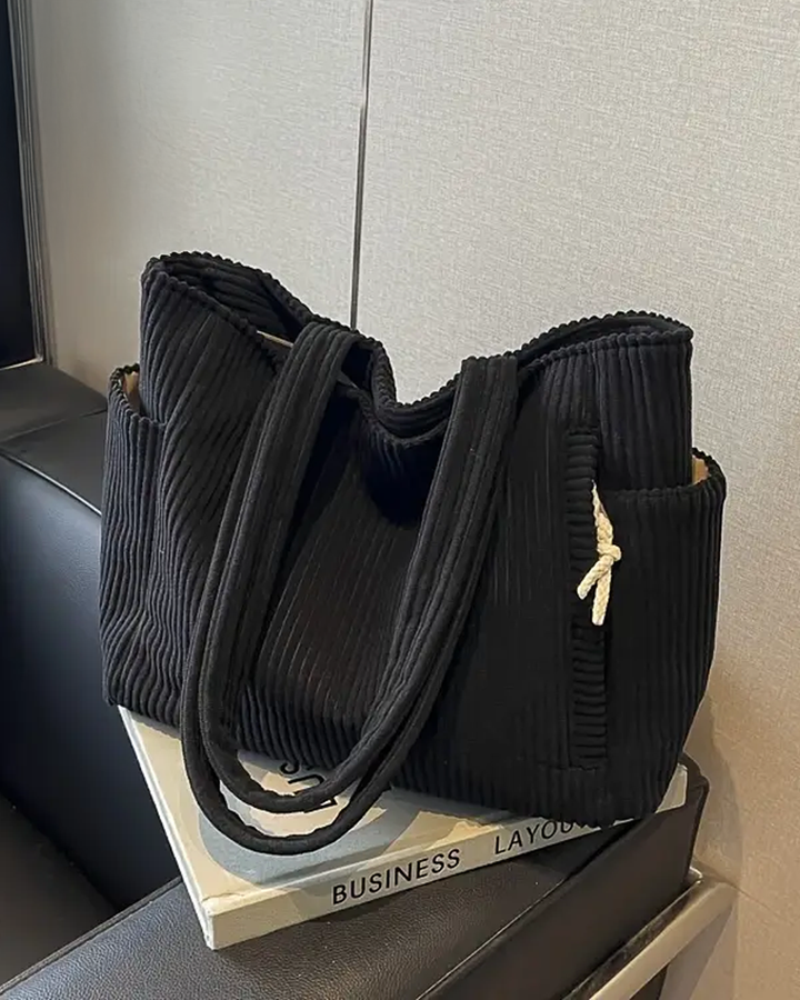 Elegant ribbed tote for women, a stylish shoulder bag with unique cord detail. Perfect spacious everyday bag.