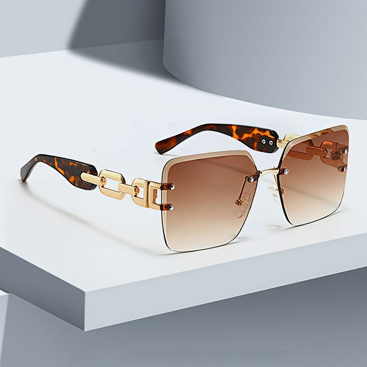 Elegant women's chain link rimless square sunglasses, perfect accessory for UV400 eye protection.