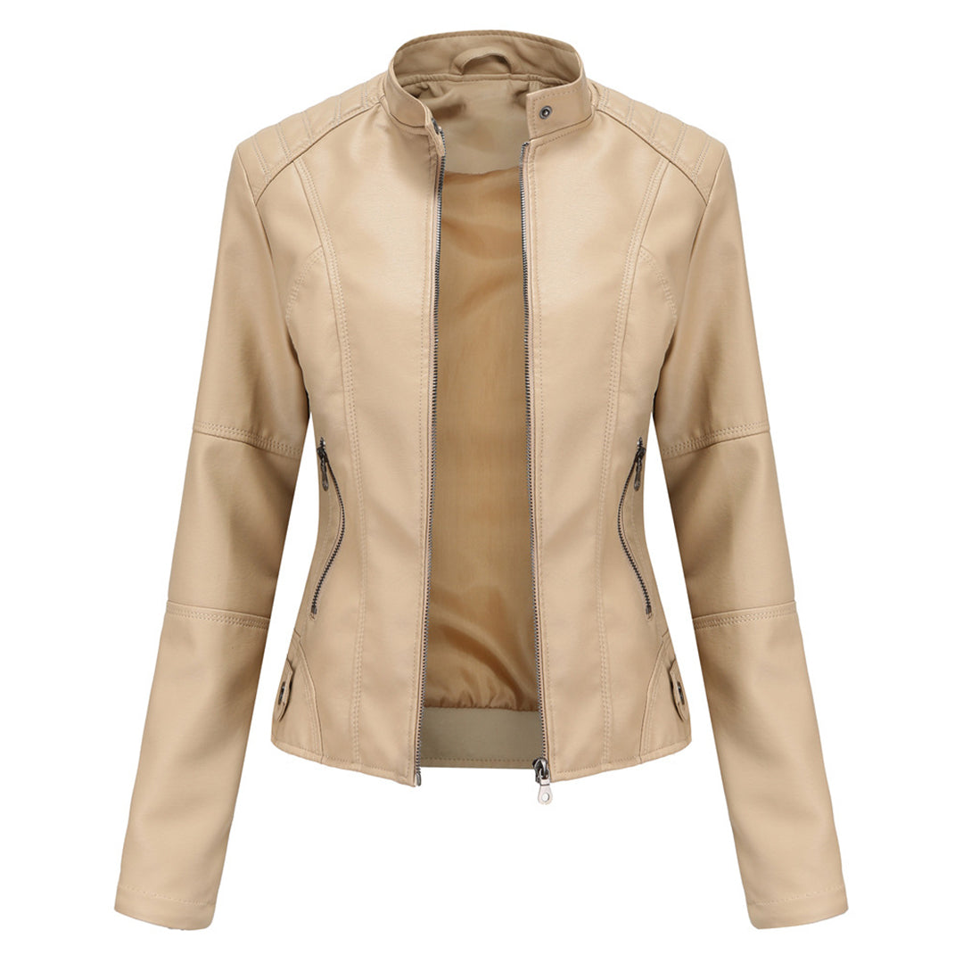 Woman wearing a stylish Romy leather jacket, showcasing its modern design and flattering fit.