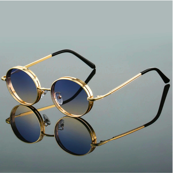 Black round UV400 women's sunglasses with a gold frame, offering essential eye protection.