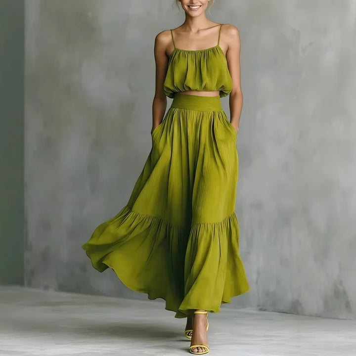 Women's stylish ruffle hem crop top & high-waisted maxi skirt two-piece set, perfect for summer beach holidays.