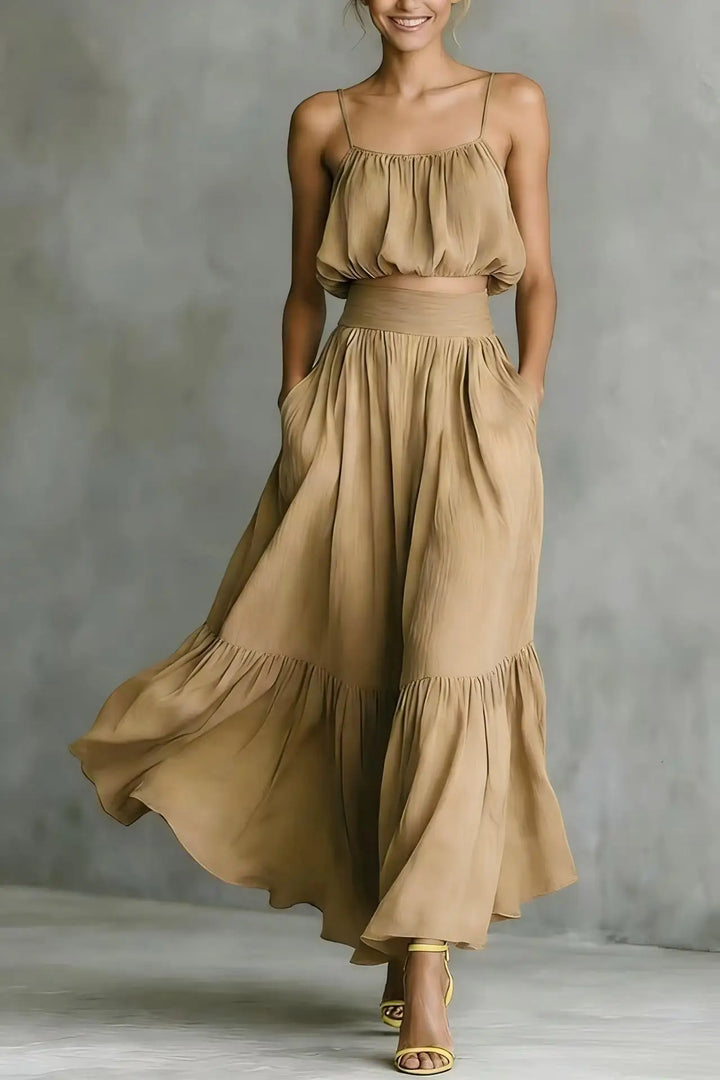 Comfortable women's summer holiday two-piece set with a crop top and ruffle hem maxi skirt for beach.