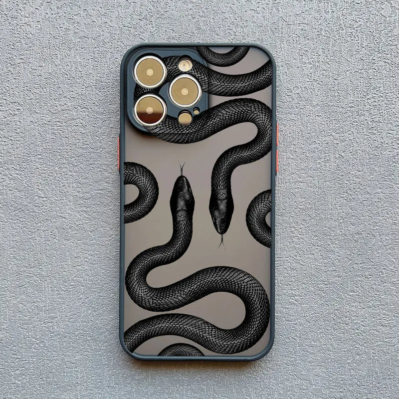 Durable protective iPhone case for women, adorned with a stylish metallic serpent design motif.