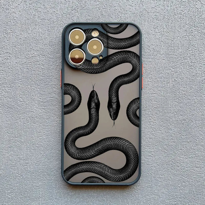 Durable protective iPhone case for women, adorned with a stylish metallic serpent design motif.