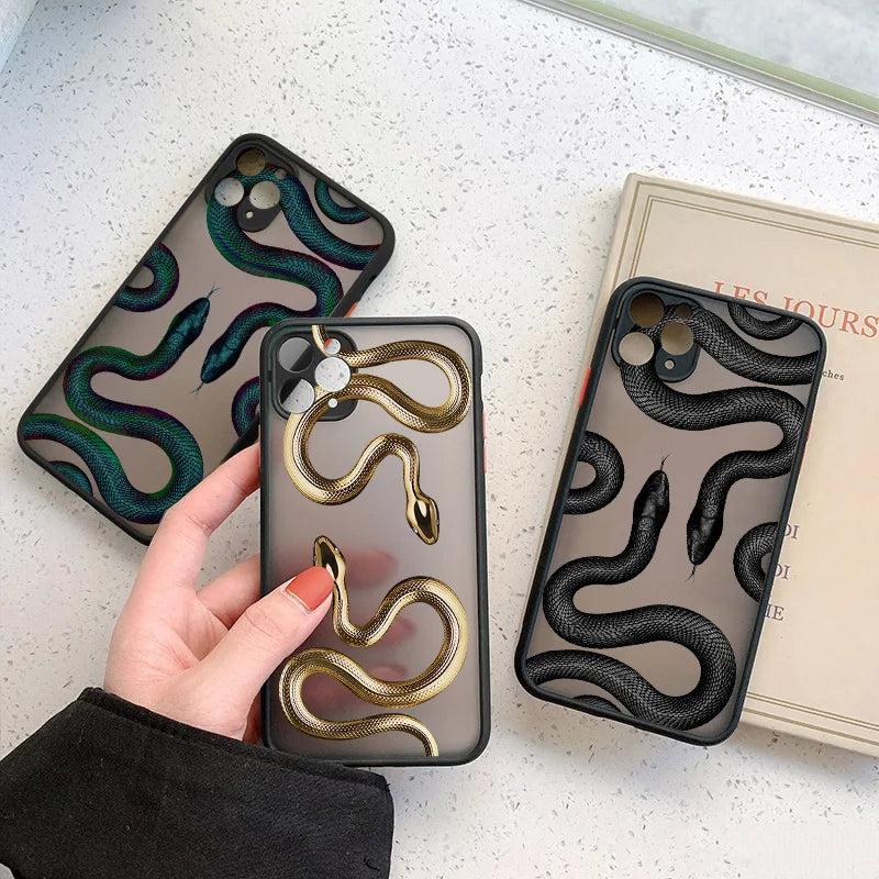 Stylish women's phone accessory: a protective iPhone case with an elegant metallic serpent motif.