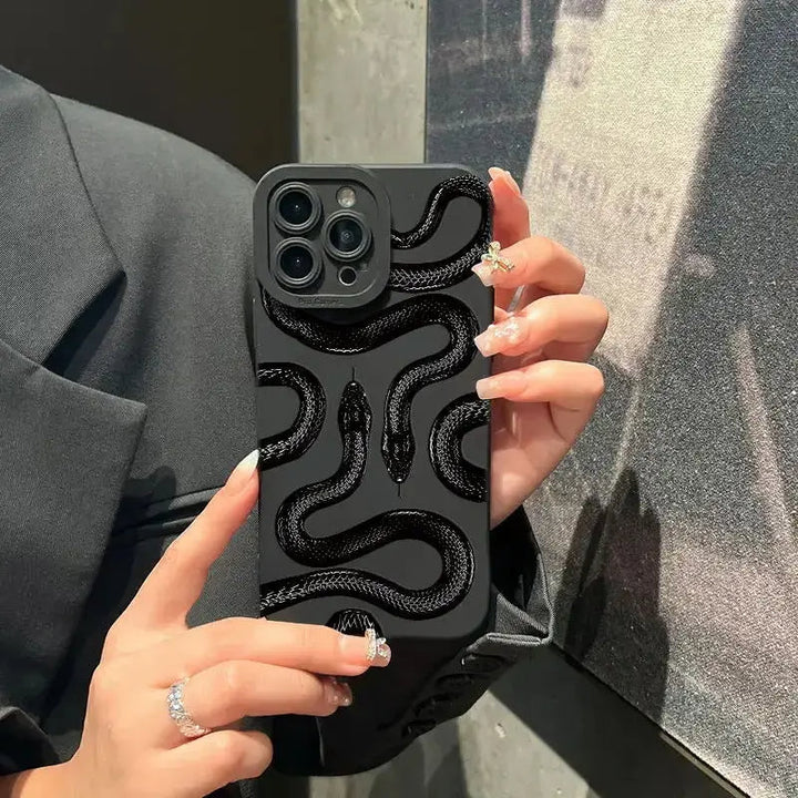 Metallic serpent protective iPhone case, a luxury phone accessory for women seeking stylish durability.