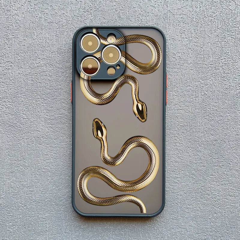 Women's tech accessory: a stylish and durable iPhone case with an eye-catching serpent motif design.