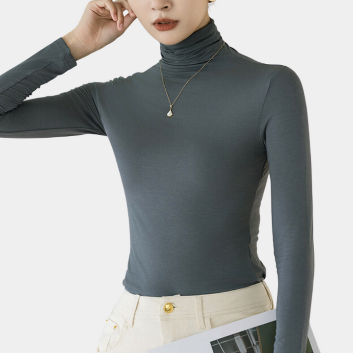 Versatile women's sienna modal turtleneck sweater, ideal for casual or dressed-up looks.