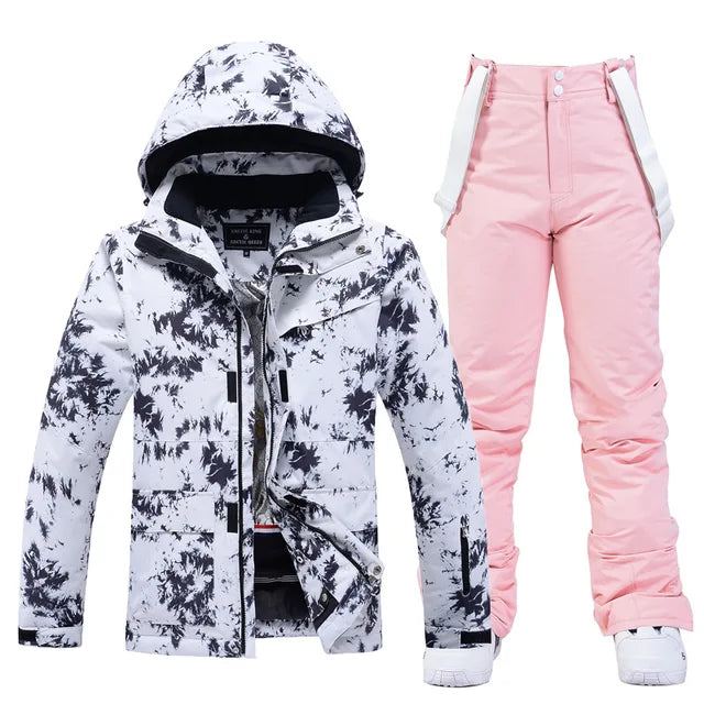 Blue women's stylish ski suit, perfect for winter skiing & outdoor activewear.