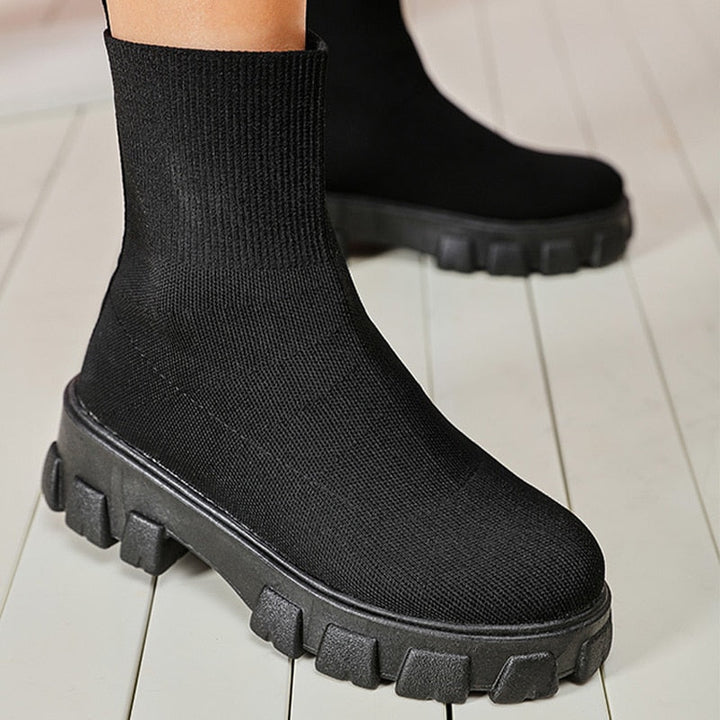 Vibrant red women's slip-on Paris boots, fashionable ankle boots for a bold, stylish everyday look.